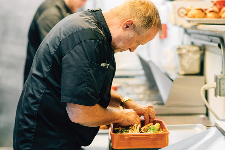 Chef Colin Smith prepares dishes for his business, Roundabout Catering & Party Rentals, in Reno, NV.