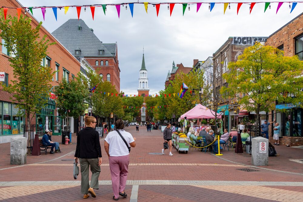 People walking through the pedestrianised Church Street in Burlington, Vermont, USA.
