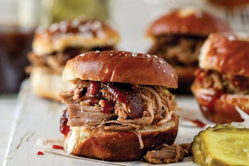 BBQ sandwich with pickles on the side