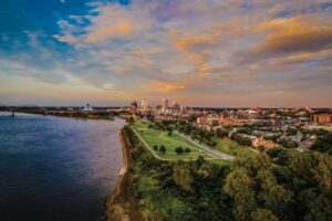 A skyline view of downtown Memphis, Tennessee with Tom Lee Park in the foreground.