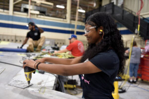 Students with the 402nd Software Engineering Group’s internship program get hands-on experience with aircraft components.
