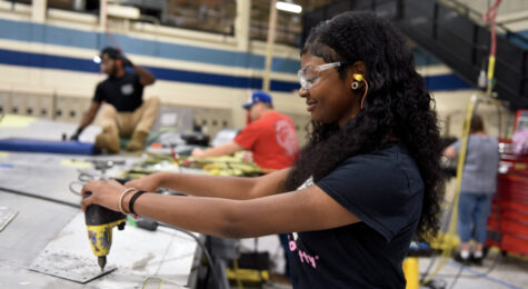 Students with the 402nd Software Engineering Group’s internship program get hands-on experience with aircraft components.