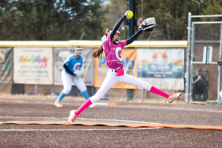 Softball game action during the Halloween Bash Softball Tournament at Runyon Field Sports Complex in Pueblo, Colorado.