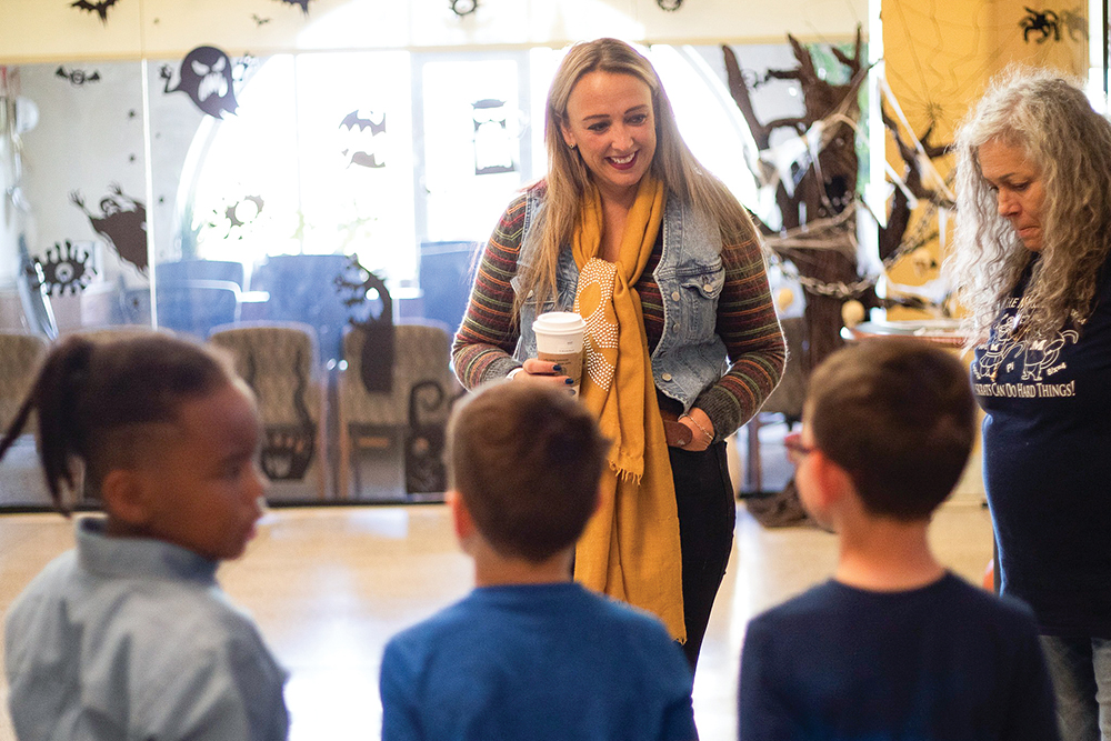 Pueblo Mayor Heather Graham talks with school children.