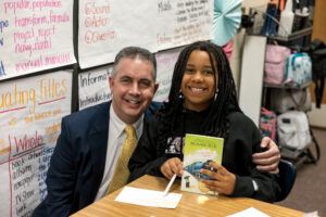 Dr. Richard Rogers, who is the new superintendent of the Houston County School District, visits with students at Matt Arthur Elementary School.
