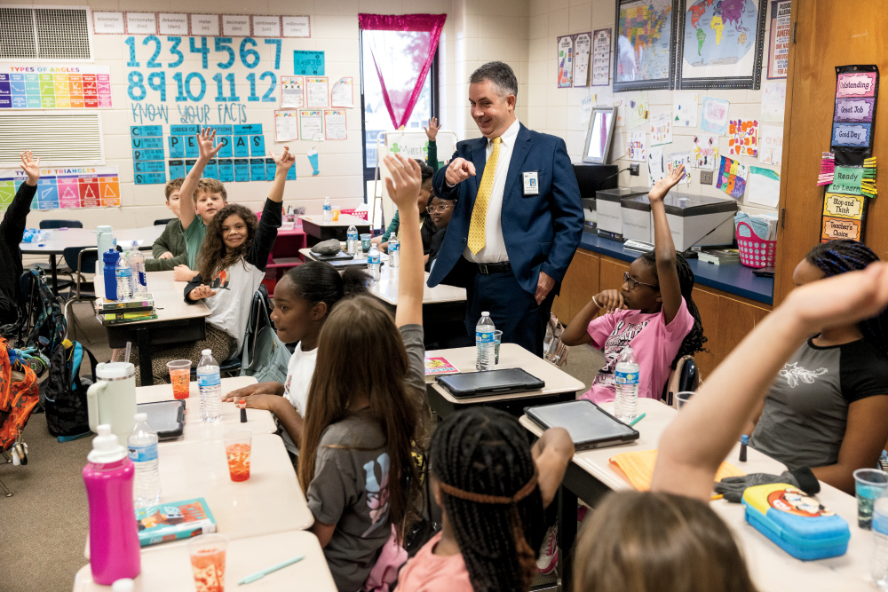 Dr. Richard Rogers, who is the new superintendent of the Houston County School District, visits with students at Matt Arthur Elementary School.