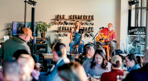 A feale singer and male guitarist perform at Full Fledged Brewing Co. in Council Bluffs, IA.