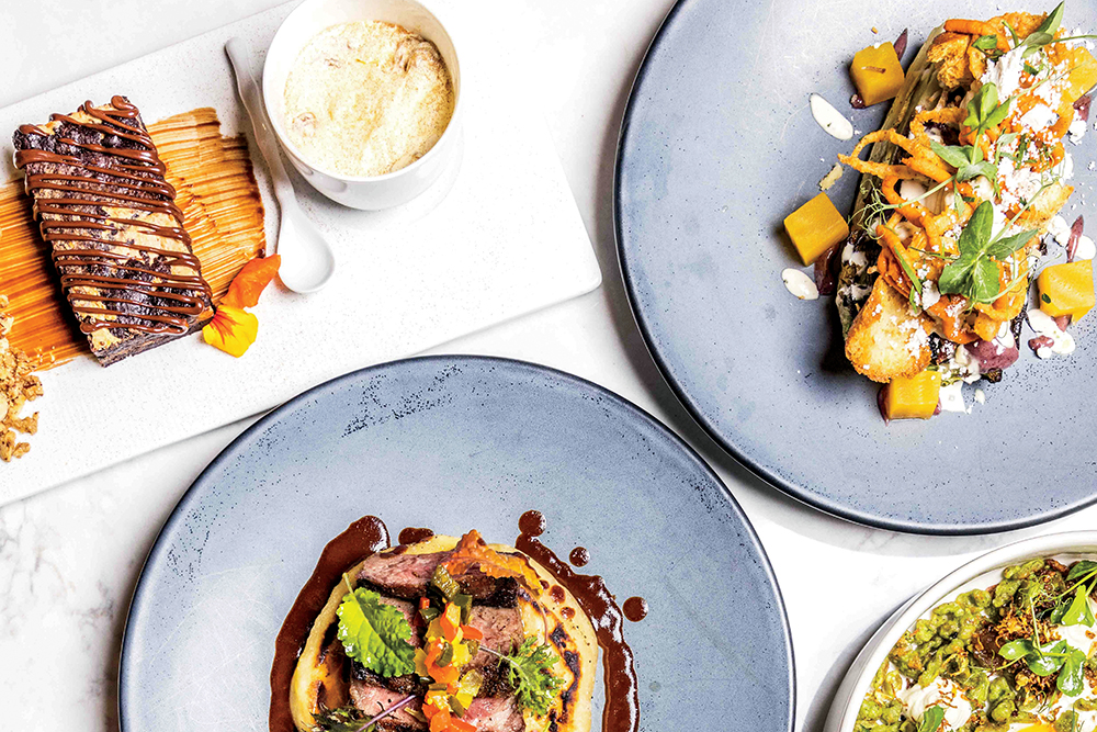 An array of dishes at Silas Creative Kitchen in Versailles.