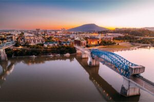 Vibrant Colored Sunset over the Chief John Ross Drawbridge and the Chattanooga Tennessee Skyline stock photo