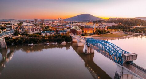 Vibrant Colored Sunset over the Chief John Ross Drawbridge and the Chattanooga Tennessee Skyline stock photo