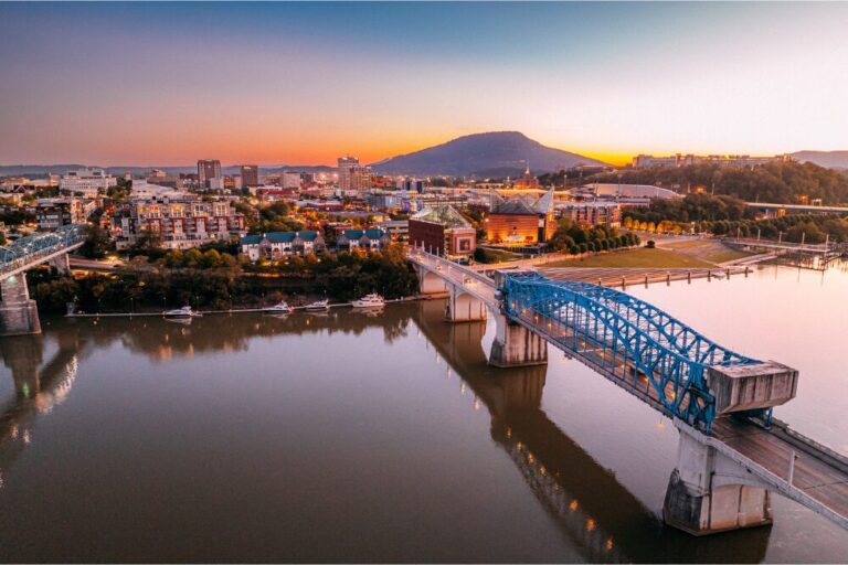 Vibrant Colored Sunset over the Chief John Ross Drawbridge and the Chattanooga Tennessee Skyline stock photo