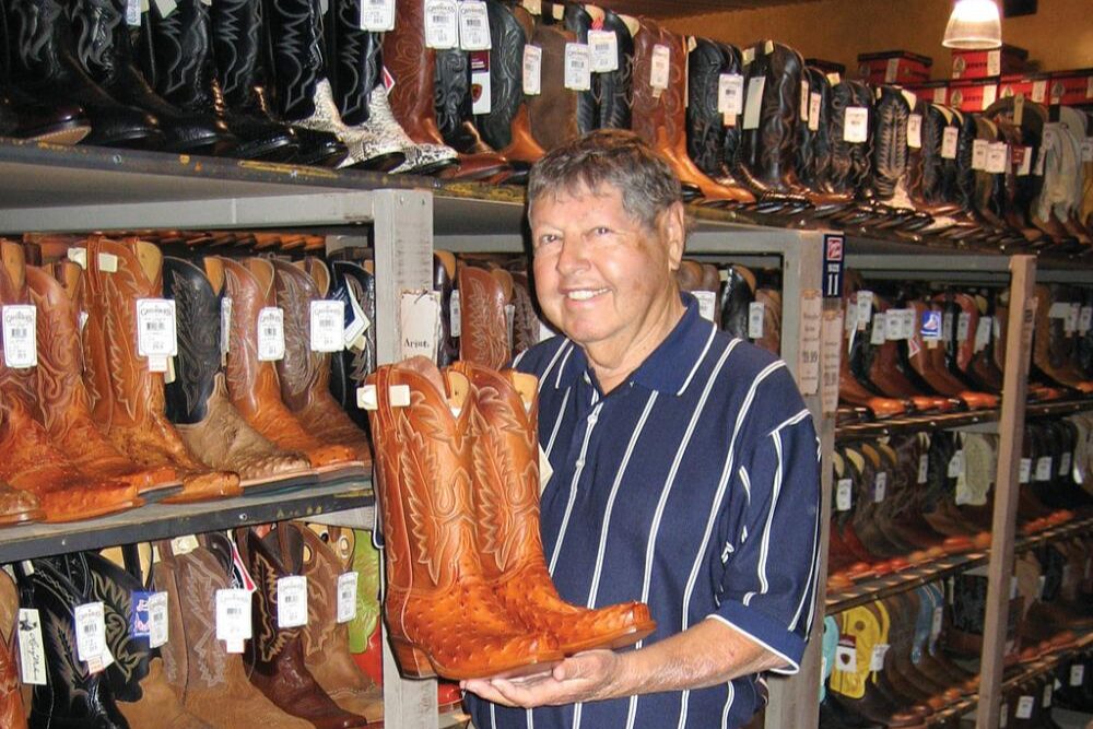 Man shops for boots in Cavender's