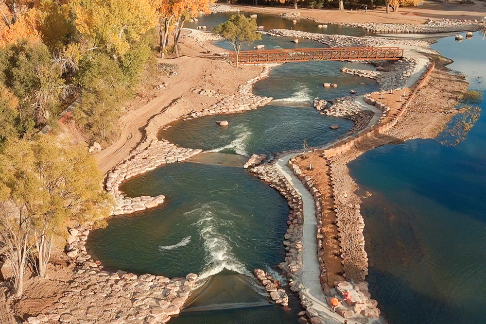 Waterworks Park on the Arkansas River in Pueblo, CO, features a series of six drop pools that can be explored by paddle boarders, kayakers and tubers.