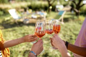 Clinking Wine Glasses Outdoors