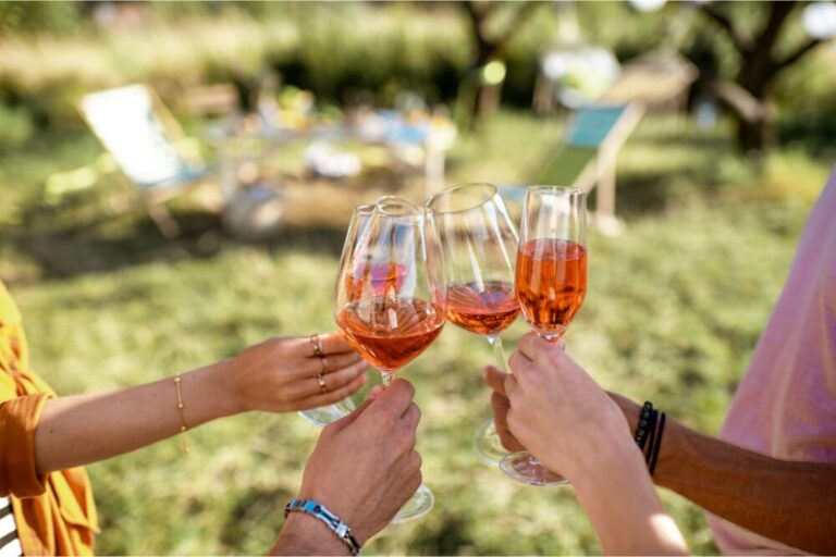 Clinking Wine Glasses Outdoors