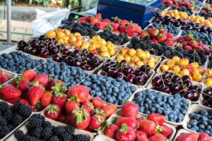 Local Grown Organic Fresh Berries and Cherries at Farmers Market. Fresh food and farmers markets in Tennessee are very important in the state.