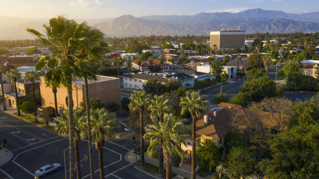 Sunset aerial view of the historic city center of Redlands, California.