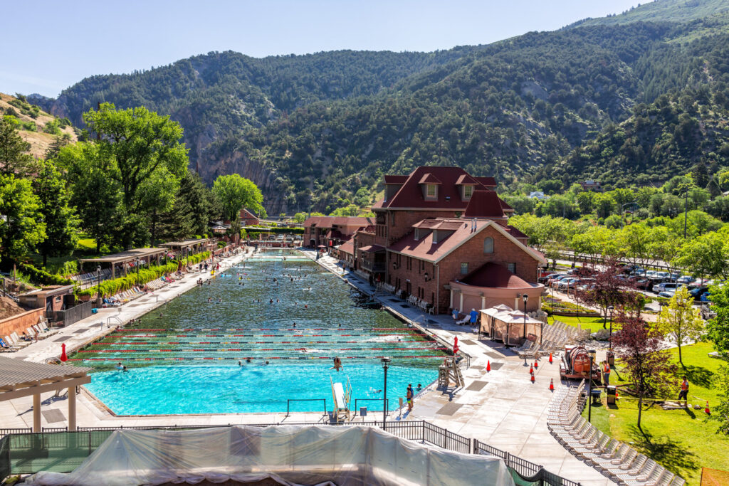 The famous hot springs pool in downtown Glenwood Springs, CO. Glenwood Springs is one of the top family vacation destinations in Colorado.
