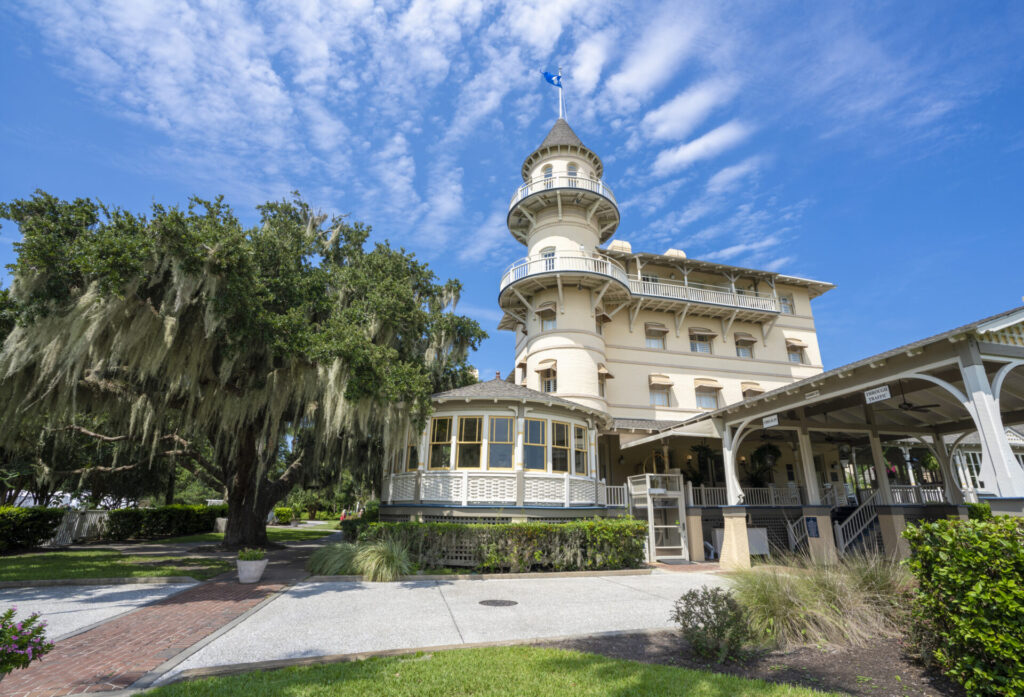 Jekyll Island, Georgia, USA - 09 10 2021. Jekyll Island Club Resort, a historical 19th century resort surrounded by beautiful  southern nature; oak tree with spanish moss.
