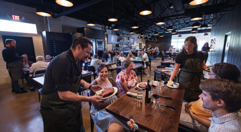 Adam Scianna serves customers at Prime & Pint in Columbia, TN.