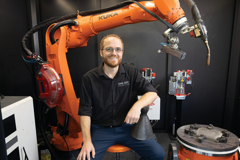CEO Nick Johnson sits in the portable Monarc WAAM Platform at One-Off Robotics, which specializes in robotic metal additive manufacturing at the INCubator in Chattanooga, Tennessee.