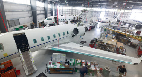 Airplanes fill a hangar at West Star Aviation at Chattanooga Metropolitan Airport in Chattanooga, Tennessee.