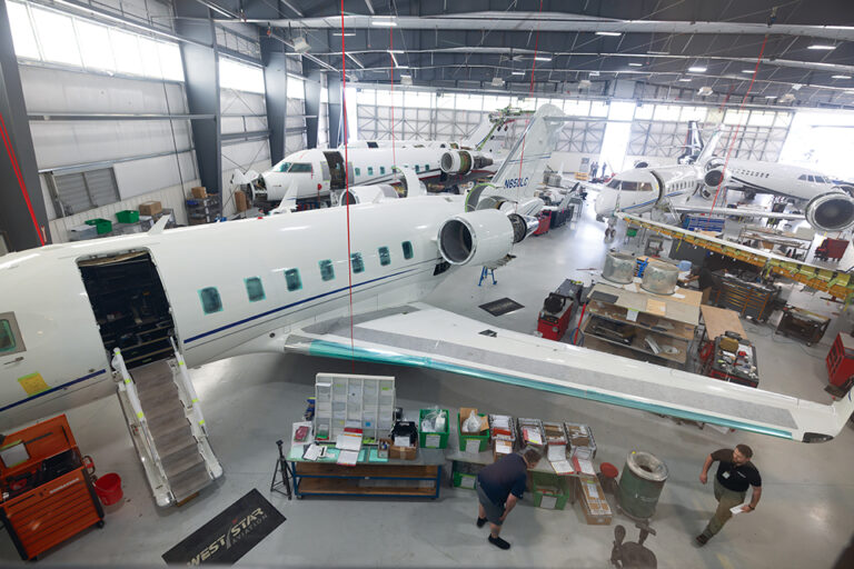 Airplanes fill a hangar at West Star Aviation at Chattanooga Metropolitan Airport in Chattanooga, Tennessee.