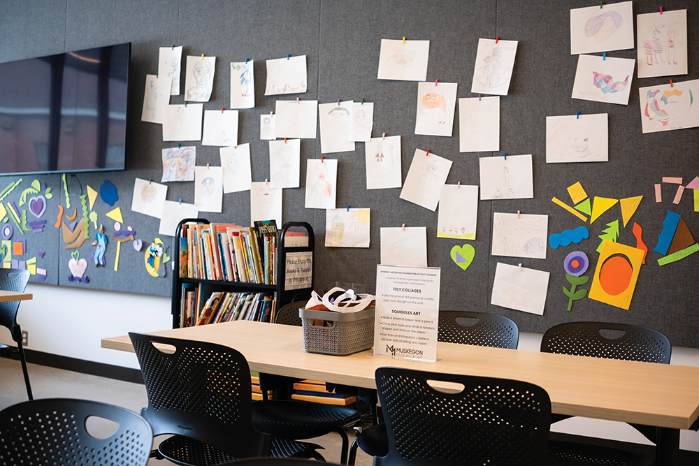 Student drawings hang on a wall in a new classroom at the recently expanded Muskegon Museum of Art in Muskegon, MI.