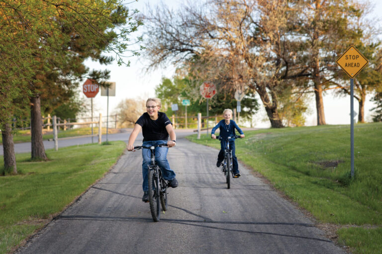 Moore Family in Spring Lake Park in Williston, ND.