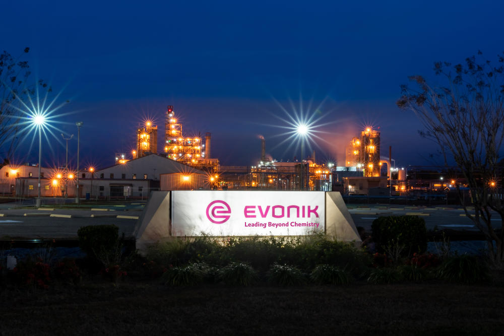 Evonik's corporate logo displayed on a sign at their Mobile campus.