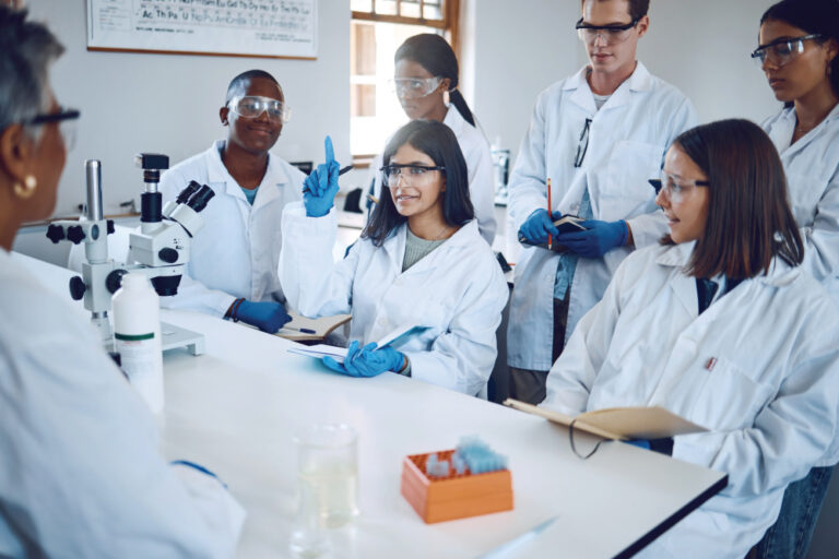 Students in laboratory studying health care.