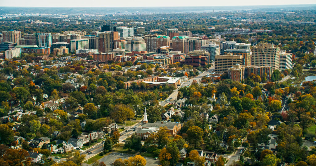 Helicopter shot of Arlington, Virginia on a hazy afternoon in Fall.
