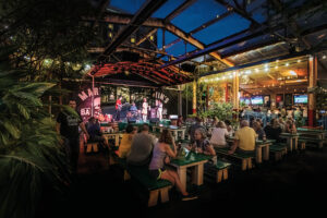 Singer Lydia Brittan and her band perform in the beer garden at Martin's Bar-B-Que Joint in downtown, Nashville, Tennessee.