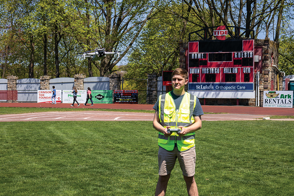 Quinn Evans flies a drone in Schuylkill County, PA. The drone pilot training program at Pottsville Area High School equips students with the skills needed to find drone pilot jobs.
