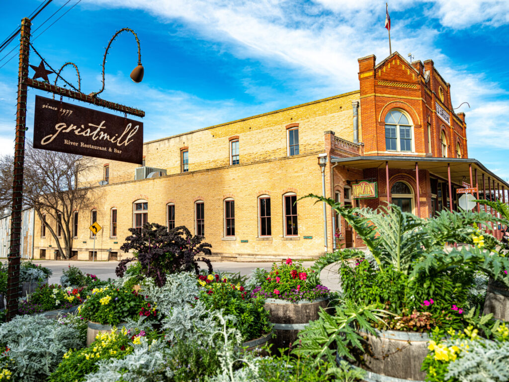 Gruene, Texas, USA- February 2, 20202. Center of a small town of Gruene in suburbs of San Antonio, Texas. Originally established by German emigrants, now a vibrant community of many different nationalities and backgrounds.View of the main intersection with tourist shops in the background.