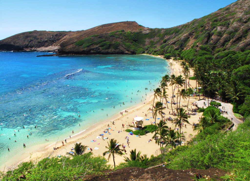 People at Hanauma Bay on the island of O'ahu, USA.  O'ahu is among the top 10 U.S. travel destinations for 2025.