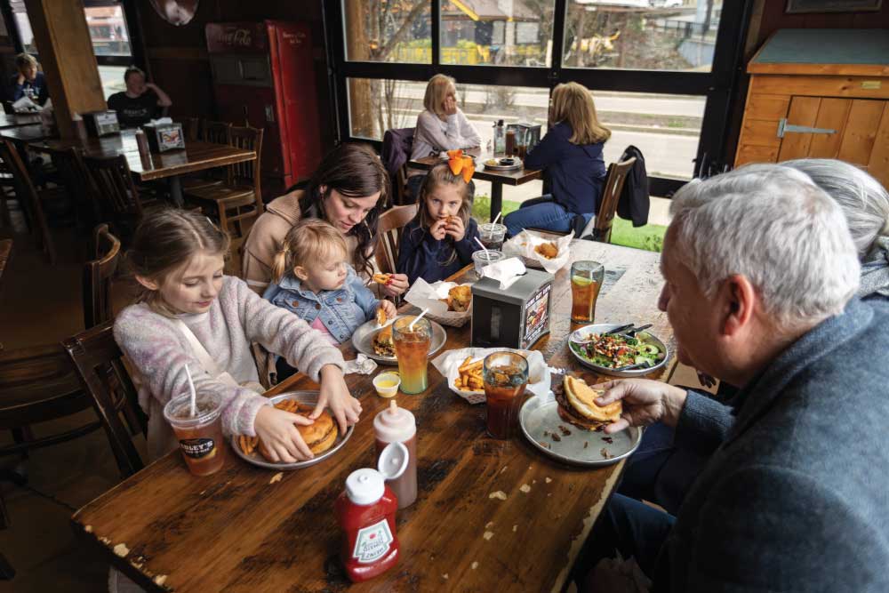 Visitors dine during lunch at Edley's Bar-B-Que in the Sylvan Park neighborhood of Nashville, Tennessee.
