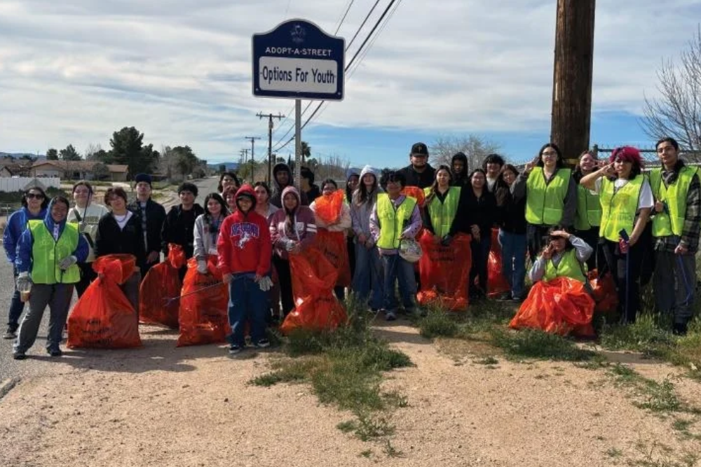 Options for Youth students and staff volunteering through the Adopt a Street program