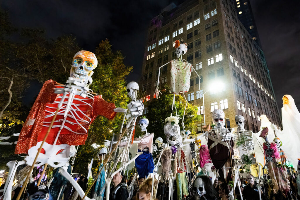 New York, NY - October 31, 2021: Scary skeletons marching team at NYC Village Halloween parade