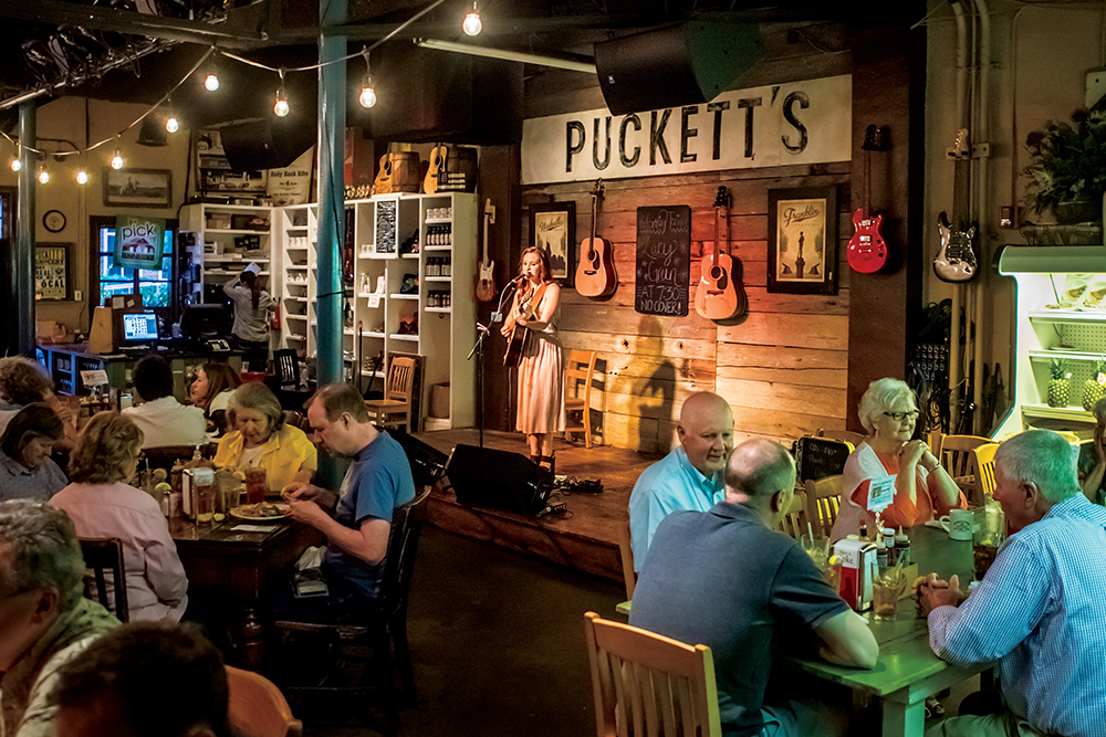 Singer Lacy Green performs for the dinner crowd at Puckett's Grocery and Restaurant in downtown Franklin, TN.