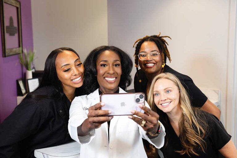 Dr. Tiffanie Garrison-Jeter, owner and dentist at Definition Dental Studio with her staff at the office in Nolensville, Tennessee.