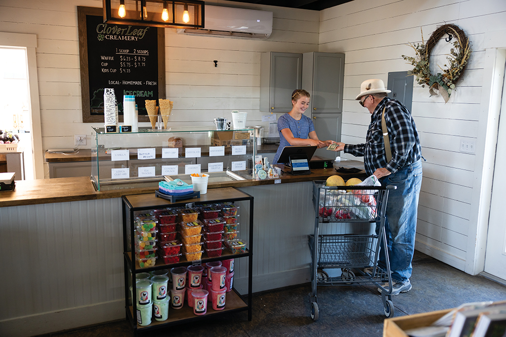 A man purchases fresh fruits, veggies and other goods from BlueRock Farm Market in Twin Falls, Idaho.