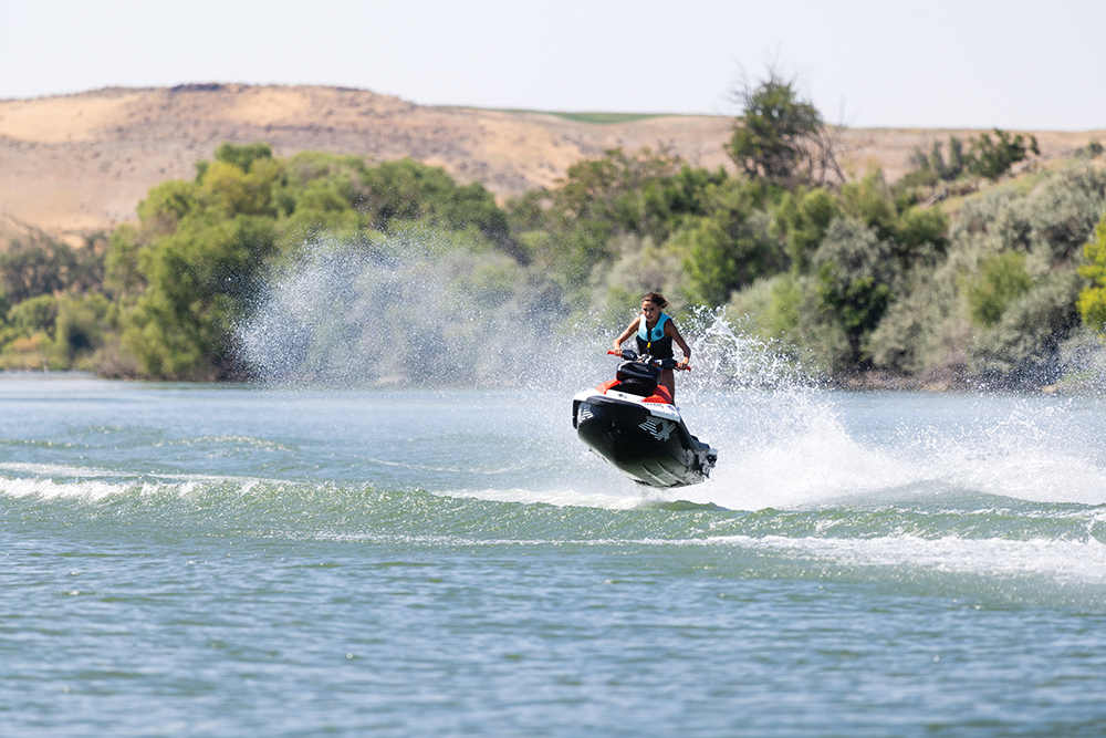 Pozy Mason rides a Sea-Doo personal watercraft on the Snake River in Buhl, Idaho.