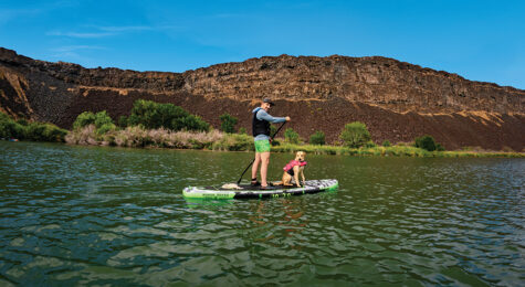 Paddle boarding with a dog on the Snake River in Buhl, Idaho.