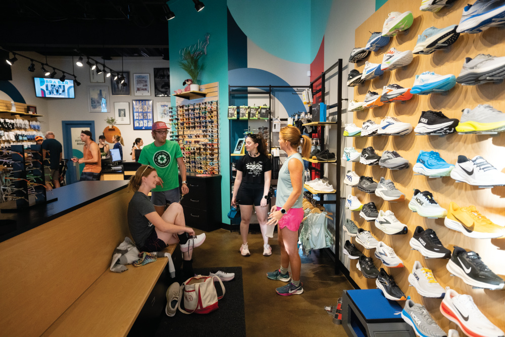 People gather for a weekly Thursday night run at Iowa Running Company in Cedar Rapids.