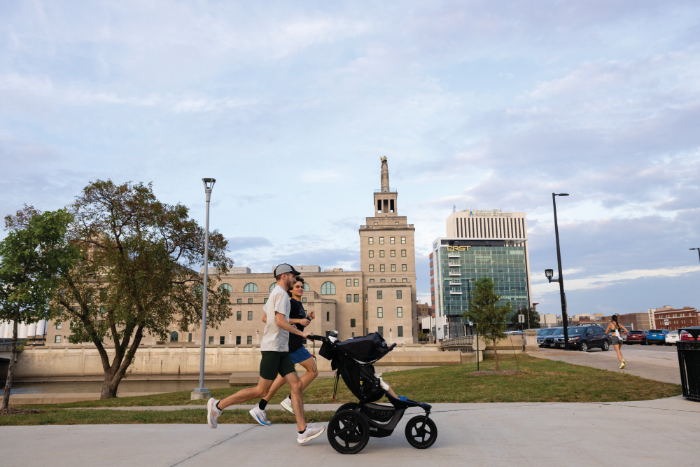 People participate in a weekly Thursday night run that starts and ends at Iowa Running Company in Cedar Rapids.