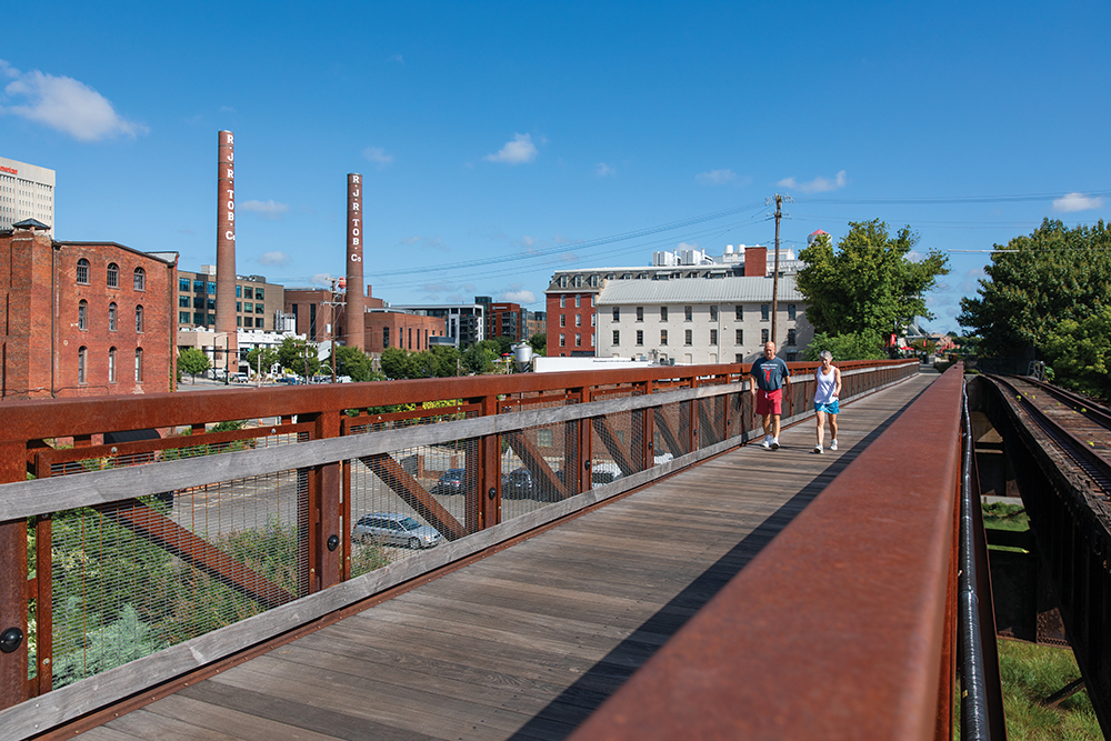 Innovation Quarter, Jack Lauer and Carol Kirby walk the Long Branch Trail through the Innovation Quarter in Winston-Salem, NC.