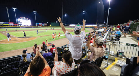 Fans react to a run scored by the Columbus Clingstones during a game at Synovus Park in Columbus.