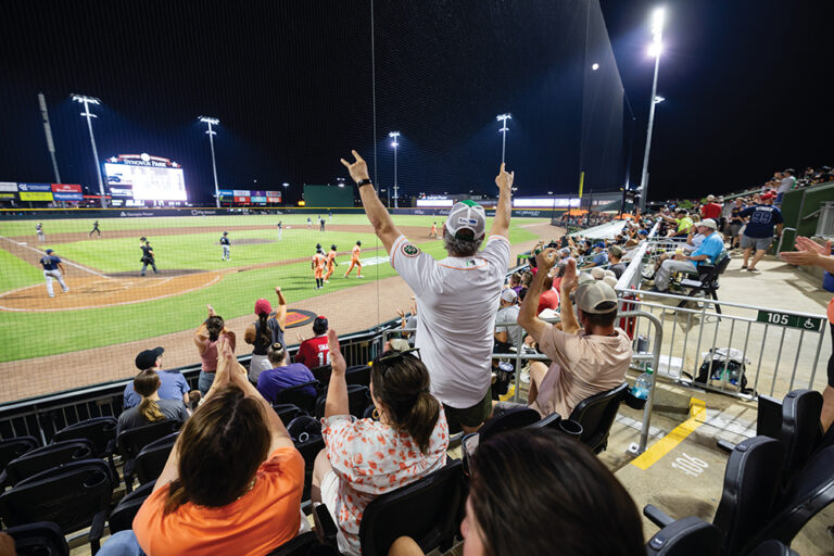 Fans react to a run scored by the Columbus Clingstones during a game at Synovus Park in Columbus.