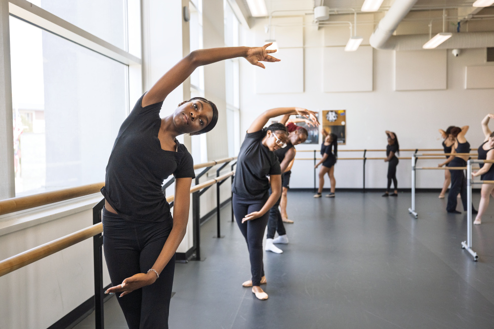 Khamani Burt practices her technique during a ballet at the Rainey-McCullers School of the Arts in Columbus.